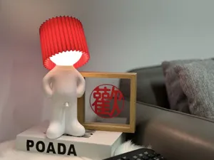 Novelty USB rechargeable night light with red pleated shade for bedroom desk ambient lighting.