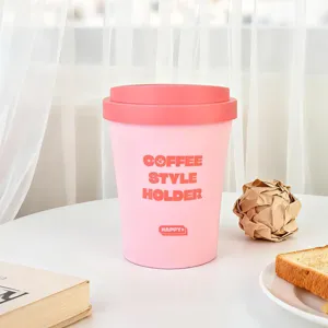Pink coffee cup shaped desktop storage container, mini waste basket for office and home use.