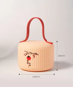 Bonita lámpara de noche LED de caqui luz de ambiente con asa de cuero para decoración de hogar.