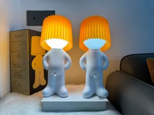 Creative shy little man USB charging nightlight with cute pleated lampshades.
