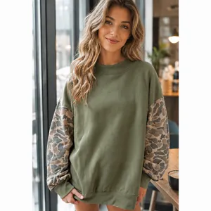 Detailed view of the women casual oversized contrast camo long sleeve fleece sweatshirt.