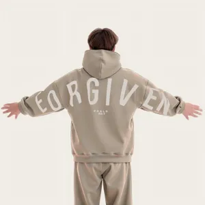 Lockerer Oversize Kapuzenpullover und Hosen Set mit stylischem Buchstaben-Druck für Damen.