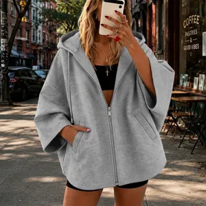 Cárdigan casual con capucha y cremallera gris liso con cómodas mangas 3/4 para mujer, ideal para otoño.