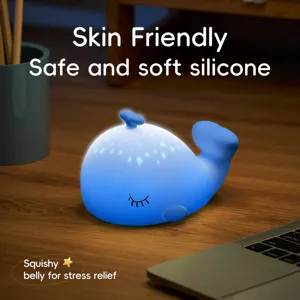 Veilleuse LED en silicone baleine bleue mignonne détail montrant matériau souple et lueur chaude