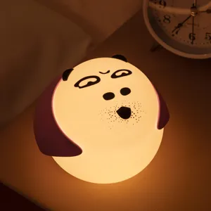 Cute silicone night light with funny expression, soft warm bedside lamp for bedroom decor.