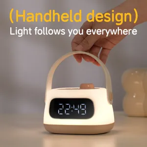 Portable LED alarm clock night light detail showing clear digital display and handy handle.
