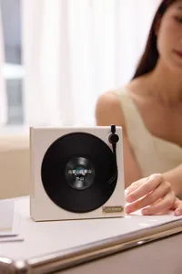 Altoparlante Bluetooth retrò in vinile creativo con display dei testi e rumore bianco.