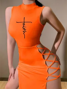 Detail view of the orange sleeveless dress with side cutout straps and faith print.