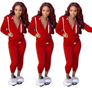 Women solid color hoodie tracksuit detail view, casual red two-piece sports outfit for autumn.