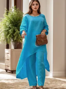 Blauwe linnen tweedelig set vrouwen casual asymmetrische top lange mouw broek outfit chic