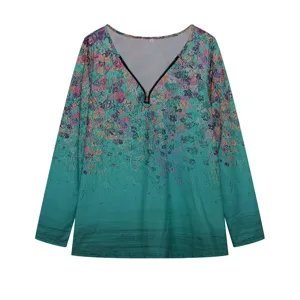 V-neck long sleeve floral print blouse detail view, teal gradient fabric with front zipper design.