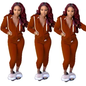 Detail view of the brown hoodie tracksuit, featuring soft fabric, comfortable fit and drawstring.