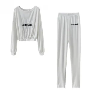 Women ribbed tracksuit autumn two piece set long sleeve top and pants with letter embroidery.