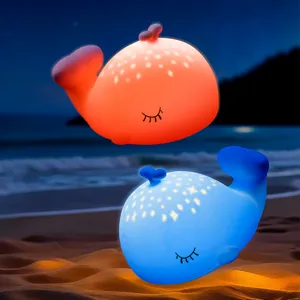 Mignonne veilleuse en silicone baleine avec projection d'étoiles, lampe de chevet LED colorée.