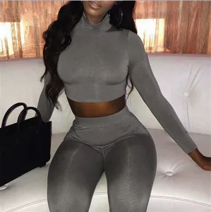 Detail view of the gray long sleeve crop top and slim leggings set, showcasing fit and texture.