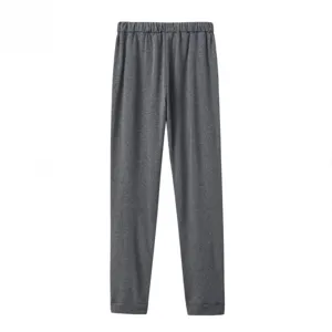 Grey casual trousers detail shot featuring comfortable elastic waistband and soft fabric.