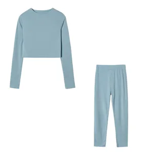 Light blue long sleeve crop top and matching leggings casual two-piece set, detail view.