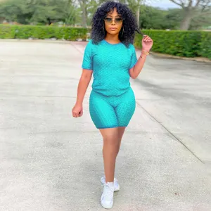 Donna estate top manica corta texturizzato e pantaloncini set due pezzi sportivo yoga outfit.