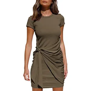 Detail shot of women's short sleeve crew neck ruched dress with side bow tie design.