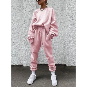Women pink casual tracksuit set long sleeve sweatshirt and loose sweatpants for daily wear.