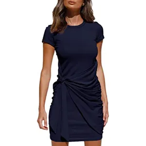 Details of the navy blue short-sleeve round-neck ruched dress with stylish side knot design.