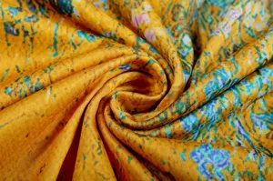 Close-up detail of women clothing abstract floral print fabric, soft texture material.