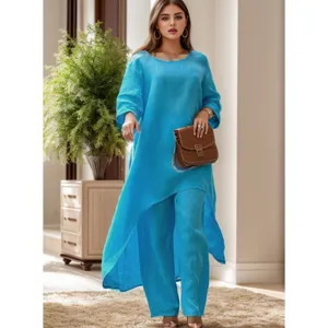 Blauwe linnen tweedelig set, lang mouw asymmetrisch top en wijde broek voor vrouwen.