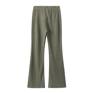 Detail view of women casual ribbed knitted flared trousers featuring soft elastic waistline.