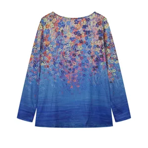 Women's blue floral gradient long sleeve V-neck top apparel detail view, casual fashion style.