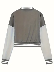 Detailed view of the colorblock jacket showing ribbed striped cuffs and collar trim.