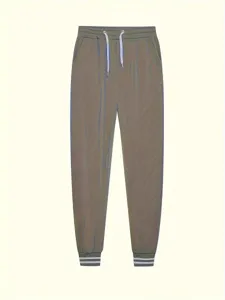 Comodi pantaloni casual da donna con vita elasticizzata e polsini a righe molto eleganti.