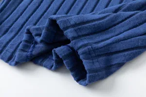 Blue knitted ribbed fabric detail, soft texture and fine stitching for autumn clothing.