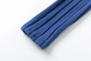 Detailed view of blue ribbed knit fabric, soft texture and flexible cuff showcase.