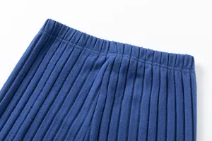 Knitted trousers detail view showing elastic ribbed waistband and soft textured fabric for women.