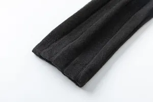 Black knitted long sleeve cuff detail, soft ribbed fabric for comfortable autumn wear.