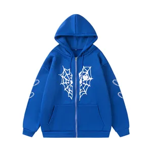 Sweat à capuche zippé bleu avec motif de cœur en toile d'araignée blanche sur la poitrine.