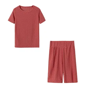 Completo fitness da donna t-shirt manica corta testurizzata e pantaloncini yoga