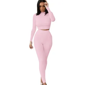 Pink ribbed two piece activewear set women long sleeve crop top and tight leggings casual