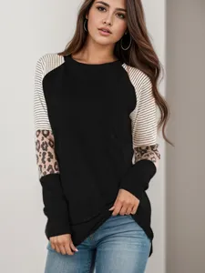 Detailed view of women long sleeve color block leopard stripe t-shirt for autumn casual wear.