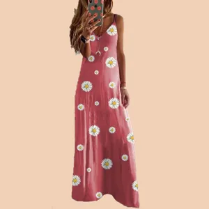 Detail view of the floral maxi dress featuring pink fabric and white daisy print pattern.