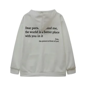 Back detail view of a beige hooded sweatshirt featuring an inspirational text print.