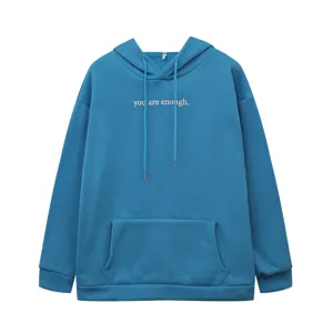 Cozy fleece-lined hoodie featuring an adjustable drawstring hood, kangaroo pocket and inspiring text.