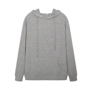 Grey knitted hoodie detail featuring ribbed texture, long sleeves and kangaroo pocket.