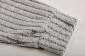 Close-up detail of grey ribbed knit sleeve cuff, perfect for autumn winter casual sweatshirts.