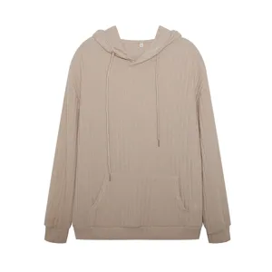 Detailed view of the knit hoodie showcasing soft ribbed fabric, adjustable drawstrings.