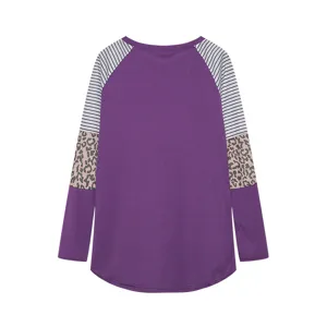 Detailed view of women's long sleeve colorblock striped and leopard patch top back.