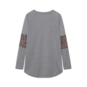 Close-up detail of the women's grey long sleeve T-shirt featuring striped and leopard sleeves.