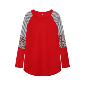 Women casual color block long sleeve t-shirt featuring striped and leopard print sleeves.