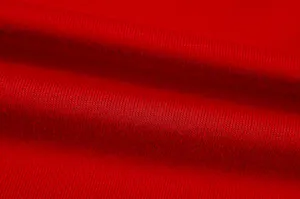 Red knit fabric detail texture close up soft material apparel swatch display