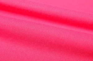 Premium pink ribbed knit fabric detail shot, soft stretchy textile texture for comfortable wear.